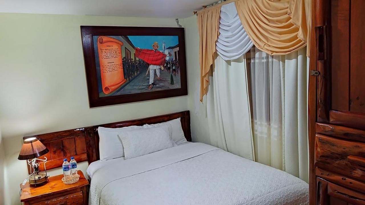 Hotel Maderanegra By Huasicama Latacunga Room photo